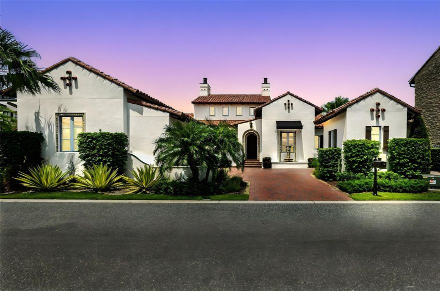 Beautiful and elegant Spanish-inspired retreat in Golden Oak at Walt Disney World® Resort - First time listed since new. Discover the perfect harmony of timeless elegance and relaxed sophistication in this beautifully crafted one-level Spanish-style cottage built by Issa Homes in 2020. Presented in as-new and move-in-ready condition with full-time use only since 2023. The Sonatina custom mediterranean floorplan offers four beds, four and a half baths, nestled within the exclusive enclave of The Cottages near Lullaby Park - one of the most desirable and newest neighborhoods of Golden Oak. Enjoy morning walks past an exclusive collection of incredible homes with timeless architecture, refined living, and a welcoming sense of community. Designed for both intimate living and grand entertaining, the home welcomes you with an impressive entry, imported European floor tiles, wood plank floors, a genuine clay-tiled roof, and a calm, neutral color palette, complemented by sophisticated Professional Interior design. An open-concept layout flows effortlessly to the expansive outdoor veranda with remote screen, where a summer kitchen overlooks your heated pool and spa with a fountain, creating a seamless indoor-outdoor lifestyle. Impressive primary bedroom with a vaulted beamed ceiling, spacious luxury ensuite bathroom with tub and shower, and a fully fitted walk-In closet. Chef’s dream kitchen is ideal for entertaining, featuring a hand-hammered copper sink, Sub-Zero and Wolf Appliances, wine cooler, high-end wood cabinetry with self-closing doors and drawers, and antique-style light fixtures. Custom interior designer upgrades Include: 'Made Goods’ lighting fixtures, Phillip Jeffries grasscloth and linen wall coverings, Samsung Art Frame TVs in all four bedrooms, large Samsung outdoor flat screen in exterior covered patio, tall privacy landscaping and palm trees with new exterior lighting in the back yard added in 2022. Fresh interior paint 2025, wired security cameras, new fountain fixtures, and more! Residents enjoy convenient access to the Summerhouse, the private Golden Oak Clubhouse, offering casual, elegant dining, beautifully landscaped courtyards, a resort-style pool, a state-of-the-art 24/7 fitness center, and an inviting family lounge. Enjoy riding your electric golf Cart from your standalone cart garage, taking shortcuts to Disney’s Summerhouse and Four Seasons amenities just moments away. A two-car garage to the front of the property provides easy access to the inside of the home. As part of Club Life: your special connection to the magic, homeowners enjoy personalized concierge-style services offered by the Golden Oak Member Services team. Enjoy private park transportation, exclusive club events, unforgettable theme park experiences, and so much more—all with the touch of Disney magic. Also within the community is the renowned Four Seasons Resort Orlando at Walt Disney World®, featuring the 18-hole Tranquilo Golf Course, a luxurious full-service spa, award-winning restaurants, and world-class amenities. Schedule your private tour today! View 360 Tour at https://www.zillow.com/view-imx/0b6a2c04-07b4-4ca4-9fda-2749d27ddf9e?setAttribution=mls&wl=true&initialViewType=pano&utm_source=dashboard