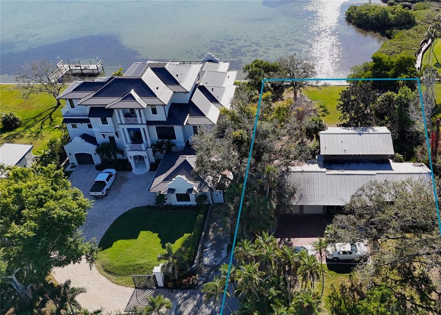 1621 Memory Lane presents a rare opportunity to build a custom bayfront estate on Little Sarasota Bay in the Bayview Acres neighborhood, one of Sarasota’s most strategically positioned mainland waterfront communities. Situated on a quiet no-through street south of Stickney Point Road and west of Tamiami Trail, this expansive .47-acre parcel offers approximately 100 feet of direct frontage on the bay and the scale to design a significant coastal residence with generous outdoor living areas, pool, and the ability to construct a private pier, subject to permitting. The property is offered as a vacant lot for $1,480,000 or as a to-be-built custom residence by The Vision Group priced at $3,980,000, providing flexibility for buyers to bring their own builder or move forward with a fully designed plan. The setting delivers privacy and calm while remaining just minutes from the south bridge to Siesta Key and equally convenient to downtown Sarasota’s dining, arts, and cultural amenities. Continued investment along the U.S. 41 and Siesta Drive corridor, including Benderson’s planned retail and mixed-use development, further strengthens the long-term appeal of this location. The property is especially well suited for buyers transitioning off the barrier islands who want mainland accessibility without sacrificing water views, as well as inland residents ready to elevate to a true bayfront setting without HOA constraints. With limited remaining buildable bayfront parcels of this size and frontage—and new construction next door on a comparable lot estimated at $6 million in value—the economics present a compelling opportunity to build at a meaningful discount to neighboring new construction.
