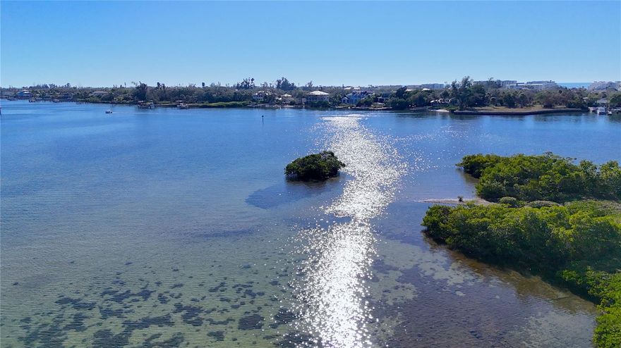Incredible opportunity to build your waterfront dream home on this expansive .47-acre parcel on Little Sarasota Bay. With approximately 100 feet of bay frontage, this is an ideal setting to create a custom coastal retreat and enjoy the relaxed Sarasota lifestyle, with the option to explore adding a private pier, subject to permitting. Tucked away on a quiet, no-through street, the property offers a sense of privacy that feels worlds away, yet remains as close as it gets to Siesta Key while still on the mainland. From here, you’re just minutes to the south bridge and the powder-white sands of Siesta Key Beach, with equally easy access to downtown Sarasota’s dining, arts, and cultural scene. It’s a rare combination of peaceful bayfront living, everyday convenience, and the quintessential Sarasota lifestyle that draws people here from around the world.