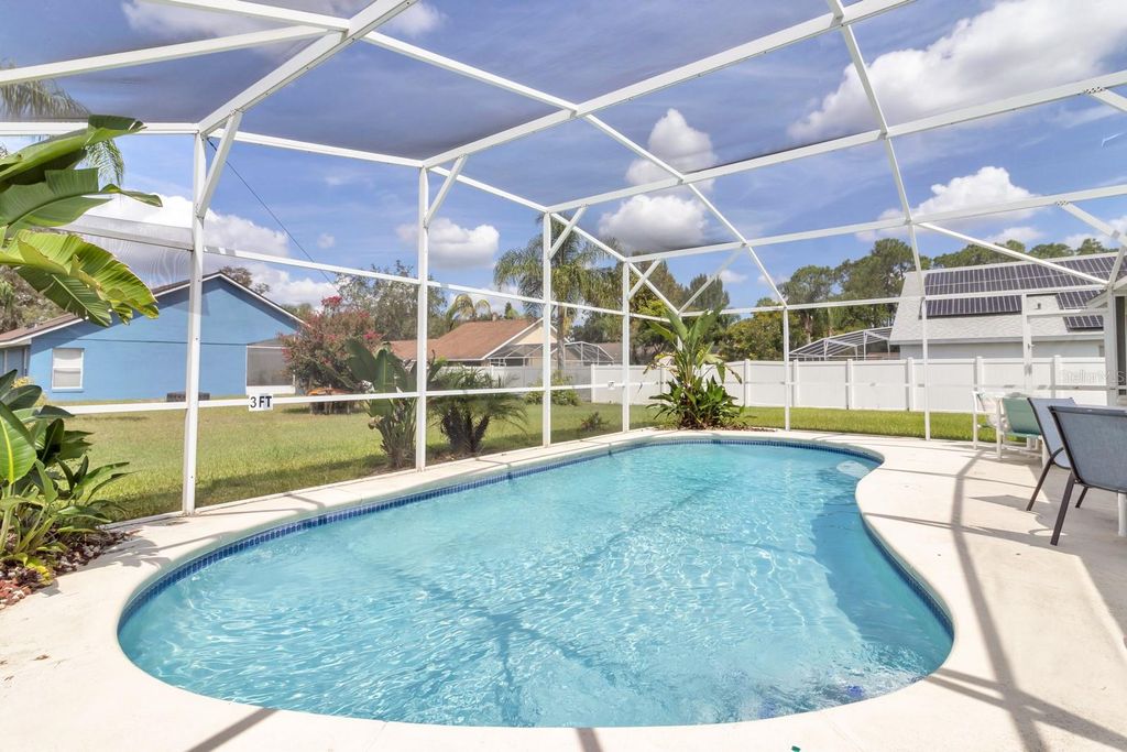 Photo of 138 Pine Lake View Drive, Davenport, FL 33837 (MLS # O6378279)