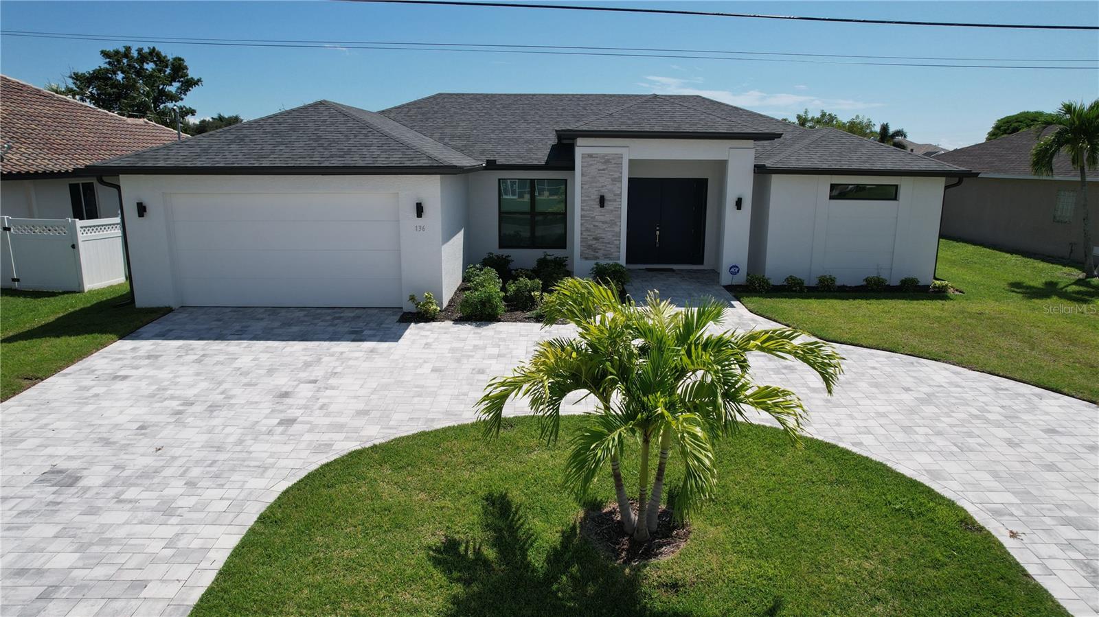 Welcome to your next vacation rental in Cape Coral! This stunning single family home boasts 3 bedrooms, 2 bathrooms, and a 2 car garage, perfect for those who love to entertain or just want extra room to relax. The in-ground heated pool and sundeck provide the perfect oasis for relaxation and soaking up the Florida sun year round. The office space is ideal for those who work from home or need a quiet space to focus. The Office includes a "murphy bed" in case extra sleeping space is needed. The granite counters, stainless steel appliances, and tile flooring give the home a modern and luxurious feel. With gulf access, you can easily easily tie up your boat rental during your stay for extra water adventures. The circular driveway adds to the curb appeal of this already beautiful home. Fully furnished and available for short term rentals, this home is perfect for those looking for a turnkey vacation or relocation option. Don't miss out on this incredible opportunity to live the Florida lifestyle in style!