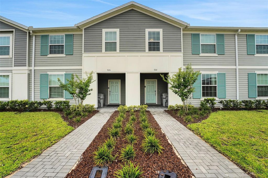 Photo of 720 Gardenia Lane, Davenport, FL 33897 (MLS # O6316353)