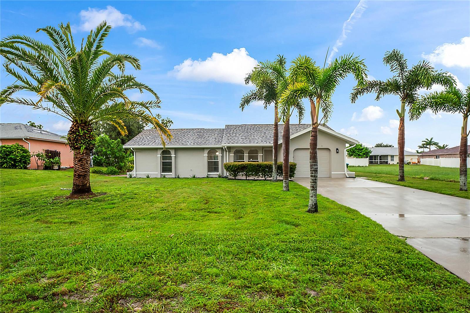 This beautifully renovated ranch combines comfort, style, and functionality in a bright, open split floor plan. Soaring ceilings, crown molding, and custom finishes highlight the inviting living and dining areas, while sliding doors lead to a private patio perfect for enjoying Florida sunshine.
The granite kitchen is a chef’s dream with newer appliances, abundant cabinetry, and plenty of counter space for meals or entertaining. The owner’s suite offers a private retreat with a walk-in closet and ensuite bath, while two additional bedrooms with large closets share a convenient full bath.
Freshly painted interiors, low-maintenance landscaping, and a lush lawn add instant curb appeal. New roof replaced 2 years ago! With a relaxing backyard, a welcoming community, and shopping and dining just blocks away, this home delivers the best of Cape Coral living.