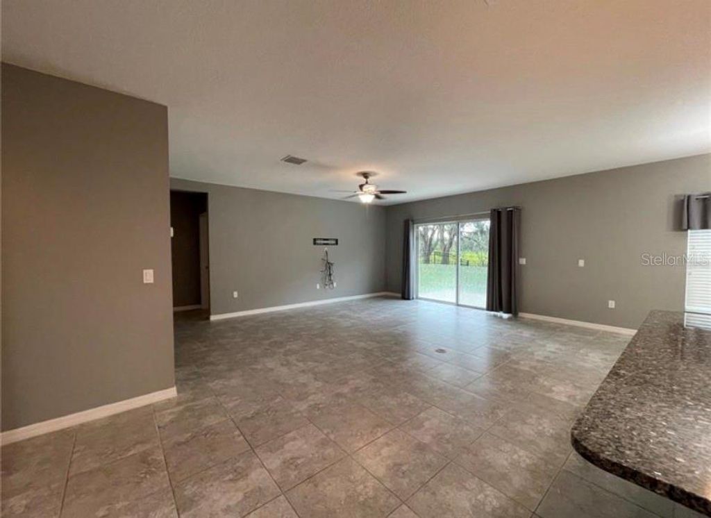 Photo of 3813 Carrick Bend Drive, Kissimmee, FL 34746 (MLS # O6411564)