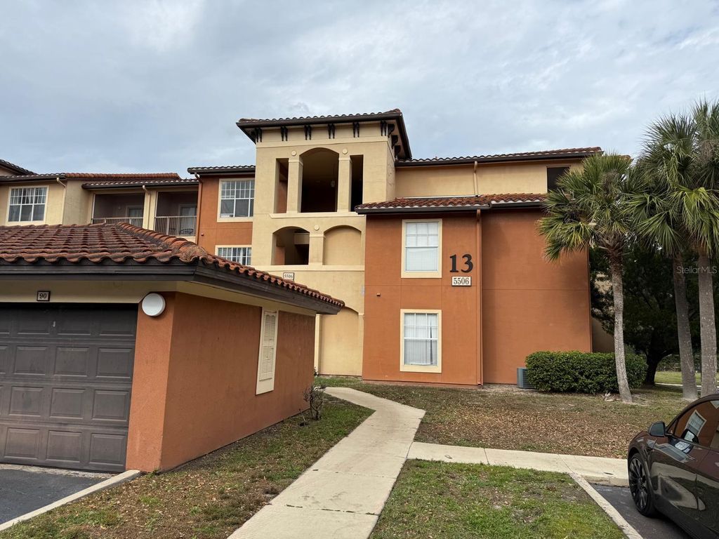 Photo of 5506 Metrowest Boulevard #211, Orlando, FL 32811 (MLS # O6368307)