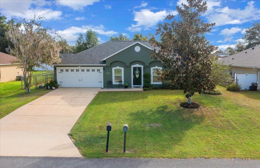 This charming 3-bedroom, 2-bathroom home has been freshly painted inside and out, offering a bright, clean, and move-in-ready feel from the moment you arrive.

Step inside to an open-concept kitchen with plenty of countertop space and cabinetry — perfect for cooking, entertaining, or enjoying family meals. The living and dining areas flow seamlessly together, creating a warm and inviting space for gatherings. The bedrooms are comfortably sized, and the primary suite features its own private bath for added convenience.

Outside, you’ll love the spacious yard — ideal for relaxing, gardening, or hosting weekend get-togethers. Nestled in the peaceful Marion Oaks community, this home combines quiet country living with easy access to shopping, dining, and I-75 for a quick commute.