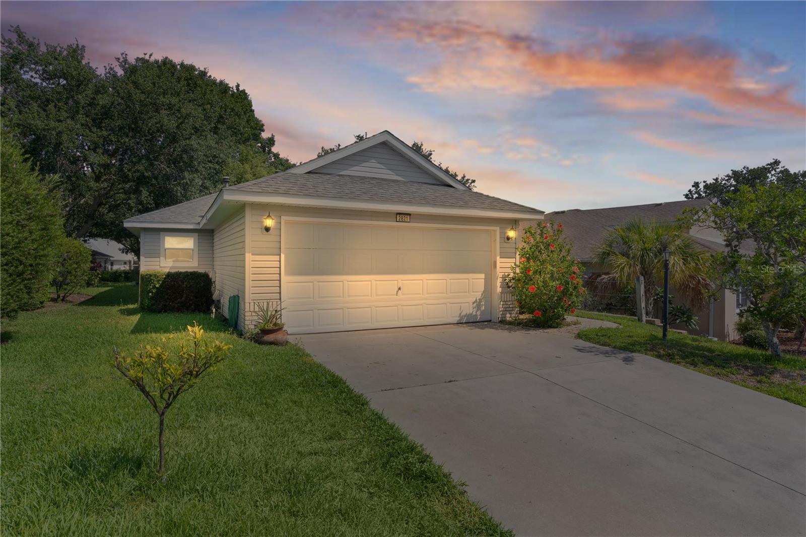 ****THIS IS THE ONE YOU'VE BEEN LOOKING FOR!!****
Step into comfort and style in this beautifully maintained 2-bedroom, 2-bath home located in the sought-after 55+ gated community of Royal Harbor in Tavares. With a new roof installed in 2018 and a new AC system in 2020, this home combines peace of mind with classic Florida charm.
Inside, you'll be welcomed by soaring high ceilings and a bright, open floor plan. The spacious kitchen is ideal for both everyday living and entertaining, offering generous counter space, ample cabinetry, and a natural flow into the dining and living areas. Two screened-in outdoor spaces—a charming side porch and a large screened lanai in the back—allow you to enjoy Florida’s beautiful weather in comfort and privacy.
Royal Harbor offers a lifestyle second to none. Residents enjoy a vibrant, active community centered around a beautiful clubhouse with fitness facilities, hobby rooms, a library, and spaces for social events. Outdoor enthusiasts can take advantage of the community's heated pool and spa, scenic walking and biking trails, and access to the shores of Little Lake Harris with a fishing pier and waterfront pavilion. Tennis, pickleball, and shuffleboard courts provide ample recreation, and there is even a secure storage area for RVs and boats.
Whether you’re relaxing at home or taking part in the community’s many social and recreational activities, this home is a perfect blend of comfort, convenience, and active living. Come experience the best of Central Florida in Royal Harbor.