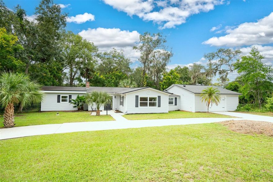 Desirable Altomonte Springs near Lake Florida. The bonus room, 15'X15', could be your 4th bedroom, den/study/flex space. The kitchen has granite tops, Stainless steel Appliances, and expands into a large dining and living area. The neighborhood is lovely and quiet. The land is nearly half an acre on a corner lot—enjoy room to garden, entertain, or expand your outdoor living space. Rare pull-through garage with doors on both sides for effortless access and extra parking (great for trailers or gear). 2014 renovation for move-in comfort.Approx. 1,664 sq ft living area with a practical flow for everyday life. Situated in a prime location, this property is just minutes away from Advent Health, the Altamonte Mall, and Crane Roost Park/Uptown, providing endless shopping, dining, and entertainment options. It offers easy access to the SunRail Altamonte Springs Station and I-4—best of all, there is NO HOA. Don't miss your chance to own a piece of this highly desirable area!