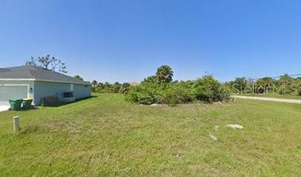 Photo of 117 Arrow Ln, Rotonda West, FL 33947 (MLS # S5092746)