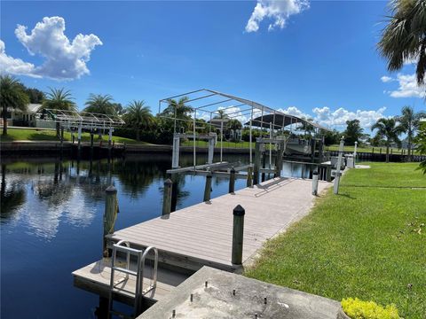 Photo of 181 N Waterway Drive NW, Port Charlotte, FL 33952 (MLS # C7518025)