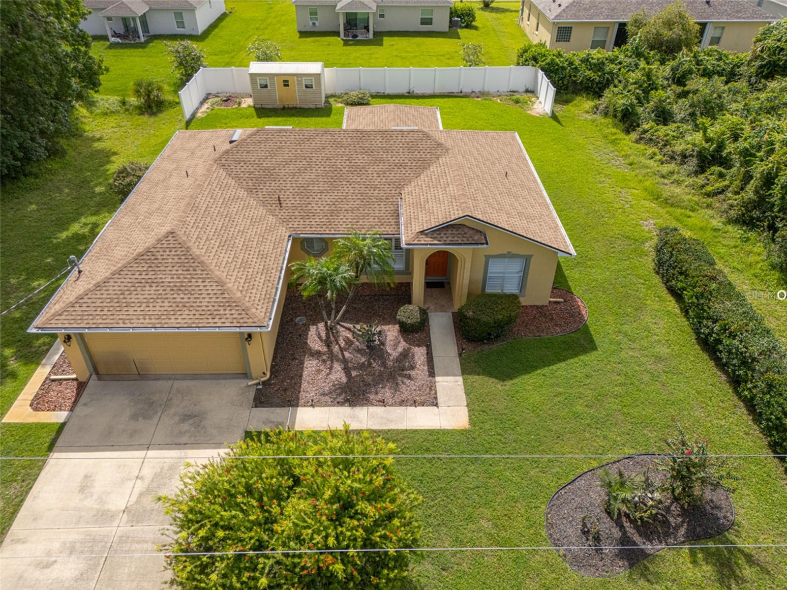 Located in desirable Palm Harbor subdivision also known as the F section of Palm Coast. Come see this Beautiful 3-Bedroom Home with Privacy & Upgrades!
Welcome to 9 Farmdale Lane – a meticulously maintained 3-bedroom, 2-bath home offering 1,622 sq ft of comfortable living in a peaceful Palm Coast neighborhood. Built in 2006. Notable Features & Upgrades :New roof (2022) and A/C (2019) for peace of mind
Granite countertops in kitchen and both bathrooms. Spacious master suite with crown molding, large walk-in closet, and a luxurious bath featuring double sinks, soaking tub, and separate step-in tile shower. Bright Florida room (enclosed) plus an extended brick patio – perfect for relaxing or entertaining. 42-inch kitchen cabinets, Whirlpool stainless steel refrigerator, Whirlpool microwave, and a rain glass door to the laundry room (with newer GE washer & dryer included) Guest bath with granite countertop and walk in tile shower. Crown molding & ceiling fans in every room, plus plantation shutters for style and privacy. Garage with side door entrance, extra-large hot water heater, and included hurricane shutters. Large shed for extra storage. Mature landscaping with bottle brush trees, crepe myrtles, and privacy hedges
Vacant lots on both sides, irrigation on well. – no immediate neighbors! Vinyl fence in the yard. This home offers the perfect blend of comfort, style, and privacy, all within a short drive to Palm Coast beaches, shopping, and restaurants. Schedule your private tour today and see why 9 Farmdale Lane could be your perfect Florida home!