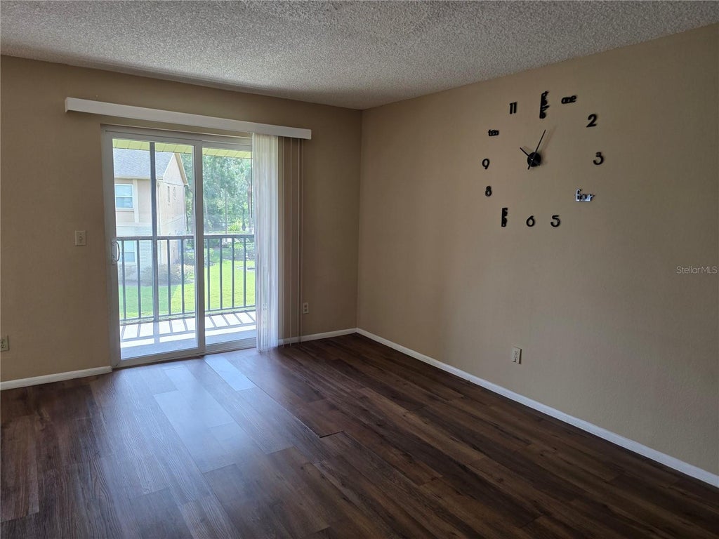 Photo of 9941 Barley Club Drive #3, Orlando, FL 32837 (MLS # S5156471)
