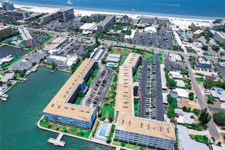 Available for annual lease starting 04/01/2026.  Experience the best of coastal living at Regency West, a vibrant waterfront community in the heart of St. Pete Beach. This beautifully maintained 2-bedroom, 2-bath condo offers the bayfront tranquility and beachside excitement just steps from the award-winning Gulf beaches. Located on the 3rd floor and fully furnished, this light-filled residence welcomes you with a well-appointed, updated kitchen and an open layout overlooking one of the community’s sparkling pools. The primary suite features an oversized walk-in closet, while both bathrooms offer modern vanities and countertops. The guest bedroom includes plantation shutters for added privacy. Regency West is known for its impressive amenities and unbeatable walkability. Enjoy two heated pools, a newly updated fishing dock, shuffleboard, a fitness center with sauna, a vibrant clubhouse, grilling areas, and laundry rooms on each floor. Assigned parking space #8 and ample guest parking. Whether you prefer watching dolphins along Boca Ciega Bay, strolling to nearby restaurants and shops, or soaking up the sun on the Gulf, this community places you in the center of it all with easy access to downtown St. Petersburg, airports, Fort De Soto, and major roadways. Hurry, make your appointment to view it today.