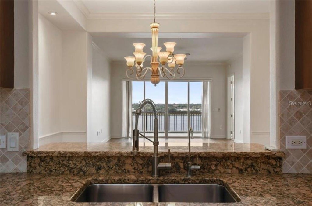 Photo of 8743 The Esplanade #29, Orlando, FL 32836 (MLS # O6449389)