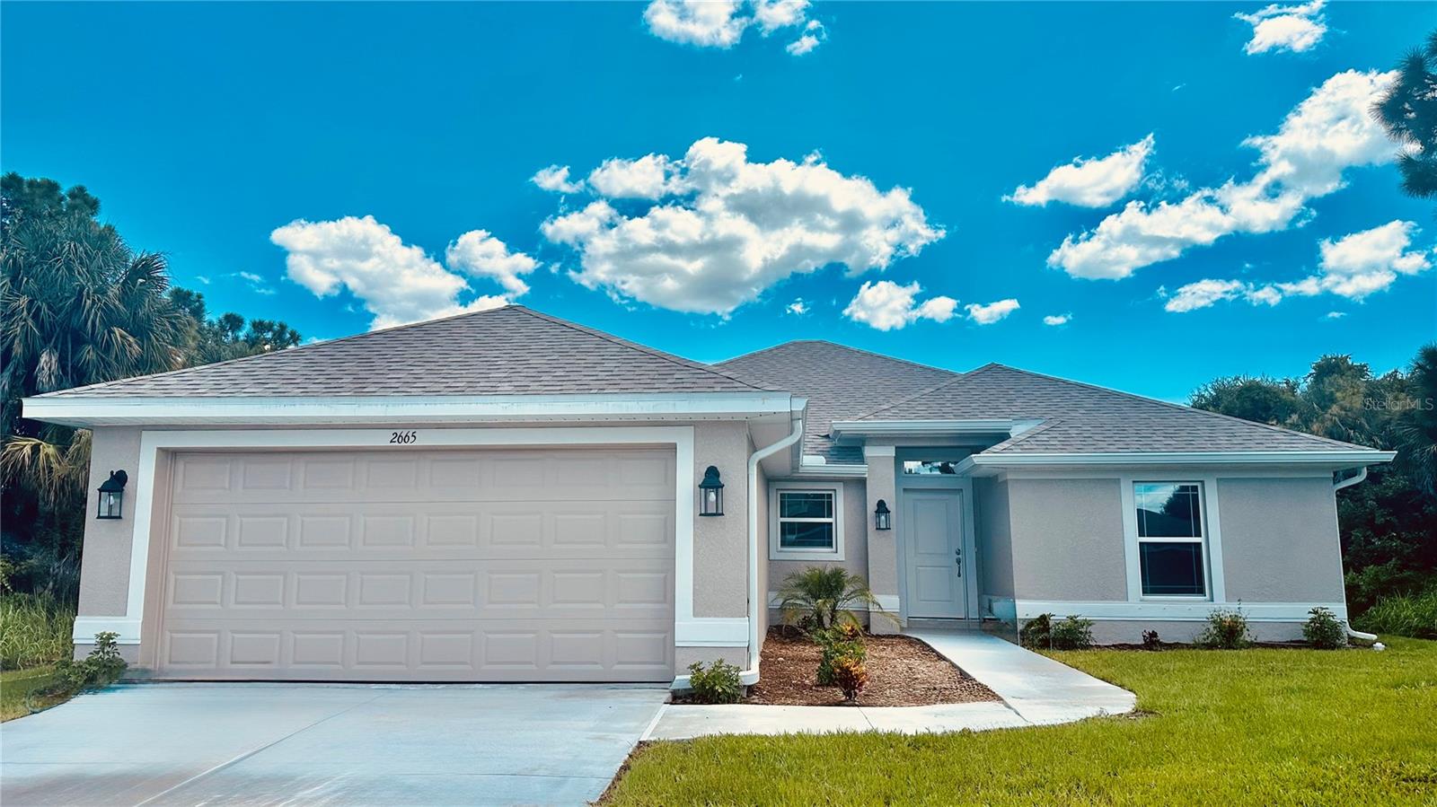 IMMEDIATE DELIVERY! MOVE-IN READY BEAUTIFULLY STAGED PROPERTY! This magnificent newly built home is complete and is situated in the vibrant North Port area, close to the intersections of I-75 and 41, providing effortless commutes for residents. With 1835 square feet of living space, the home offers 3 bedrooms, plus a study or den area providing ample room for you, your family, and guests to live comfortably. Built by Adams Homes, this property boasts a range of impressive features including 30-year mildew-resistant shingles, stylish architectural design, updated window styles, stain-resistant carpeting, brushed nickel door and bathroom hardware, 5 1/4" decorative baseboards, 5 panel doors with lever handles, designer LED recessed lighting, 36" upper cabinets with crown molding, granite counters, stainless steel appliances, double-paned insulated tilt-in sash windows and much more. The property also comes with a 10-year structural warranty. The seller is willing to cover a majority of the closing costs when using one of their preferred lenders. ~ Prices are subject to change without notice. ~ Subject to errors and omissions ~