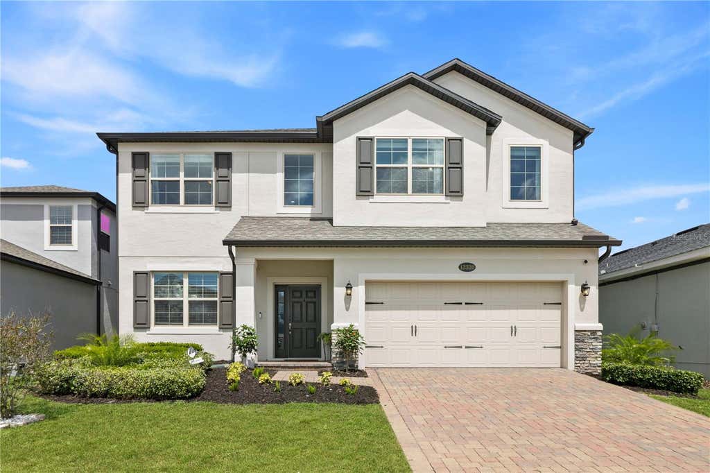 Photo of 13320 Magnolia Valley Drive, Clermont, FL 34711 (MLS # O6414839)