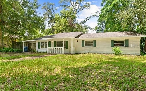 Photo of 6235 Ogburn Street, Brooksville, FL 34602 (MLS # W7890348)