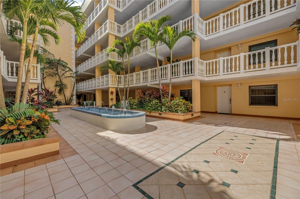 Photo of 6650 Sunset Way #105, St Pete Beach, FL 33706 (MLS # TB8552923)