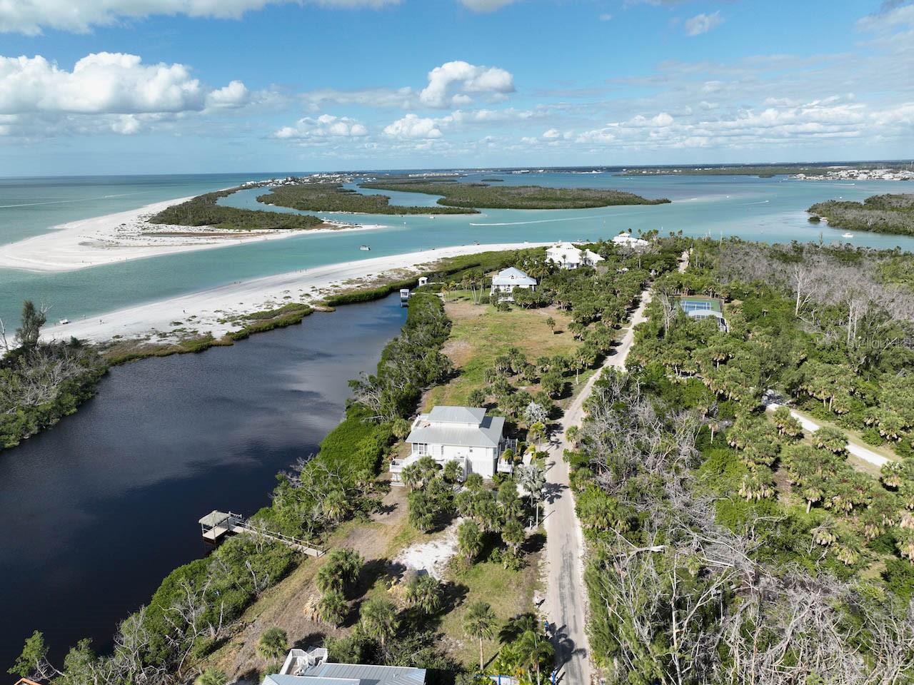 Just reduced drastically by $100,000. This exceptional home site in the exclusive gated community of Rum Cove, located on the North end of Palm Island, offers unparalleled lagoon and beachfront Gulf views. Here's what makes it stand out:
Prime Location: Situated within the gated community of Rum Cove, this home site boasts some of the finest views in all of Southwest Florida, overlooking Stump Pass and the Gulf of Mexico. Its exclusive location behind the private gates of Palm Island Resort adds to its allure and privacy.
Rare Opportunity: With only nine exclusive home sites available, opportunities to own property in Rum Cove are rare. The scarcity of these lots enhances their desirability and exclusivity.
Waterfront Living: This over half-acre home site features a fishing pier already in place on a lagoon, providing opportunities for fishing and waterfront enjoyment. Additionally, there's a first-come community dock located at the North end of the island on the Intracoastal/Stump Pass, offering further access to water activities.
Utilities and Amenities: The lot offers underground utilities, ensuring a clean and unobstructed view. Residents also have access to a range of amenities through Palm Island Resort, including an on-island restaurant, rentals for golf carts, fitness center, tennis pro, massage therapy, and more. These amenities enhance the overall lifestyle experience for residents of Rum Cove.
Private and Exclusive: Palm Island Resort is a private and exclusive golf cart resort, providing a secluded retreat for residents seeking privacy and relaxation. The gated community adds an extra layer of security and exclusivity, ensuring a peaceful and serene living environment.
Overall, this home site in Rum Cove offers the opportunity to build a dream home in a truly exceptional setting, surrounded by breathtaking views and luxurious amenities. Whether as a primary residence or a vacation retreat, it promises a lifestyle of tranquility and indulgence in one of Southwest Florida's most coveted locations.