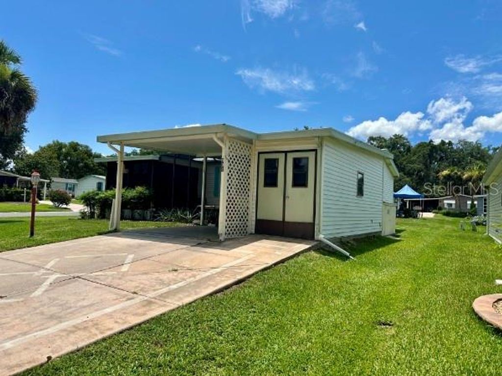 Photo of 902 Rose Lane, The Villages, FL 32159 (MLS # G5098839)