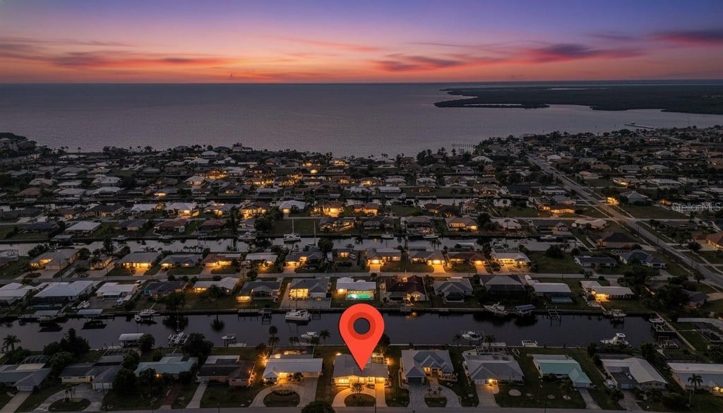 Photo of 115 Leland Street SE, Port Charlotte, FL 33952 (MLS # C7532442)