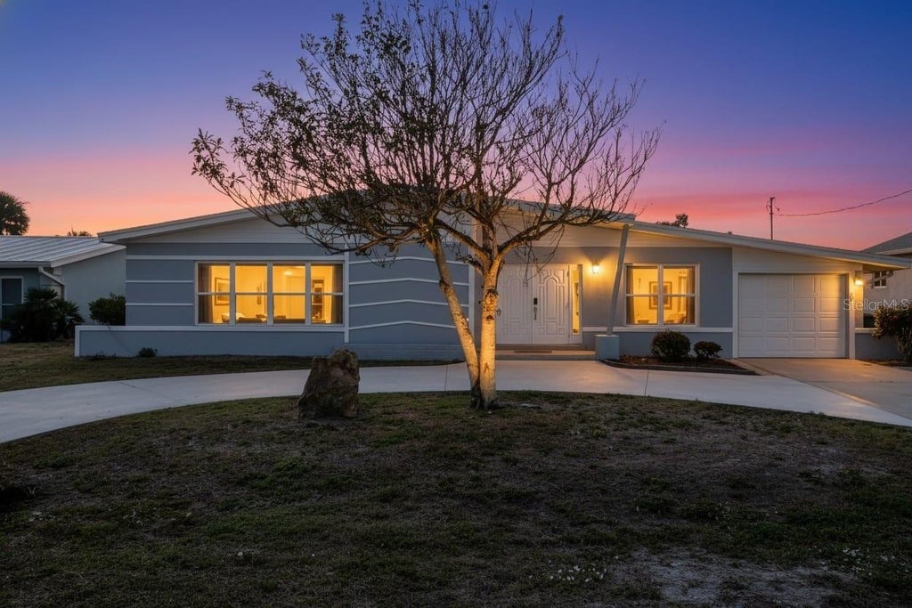 Photo of 115 Leland Street SE, Port Charlotte, FL 33952 (MLS # C7532442)