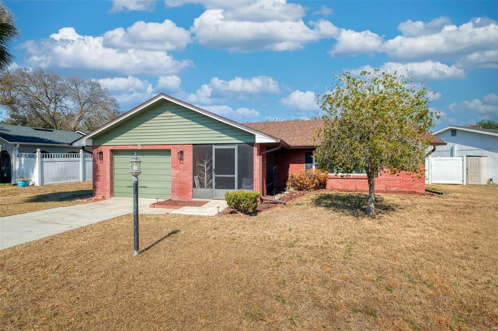 Photo of 5 Sandalwood Drive, Davenport, FL 33837 (MLS # O6381448)