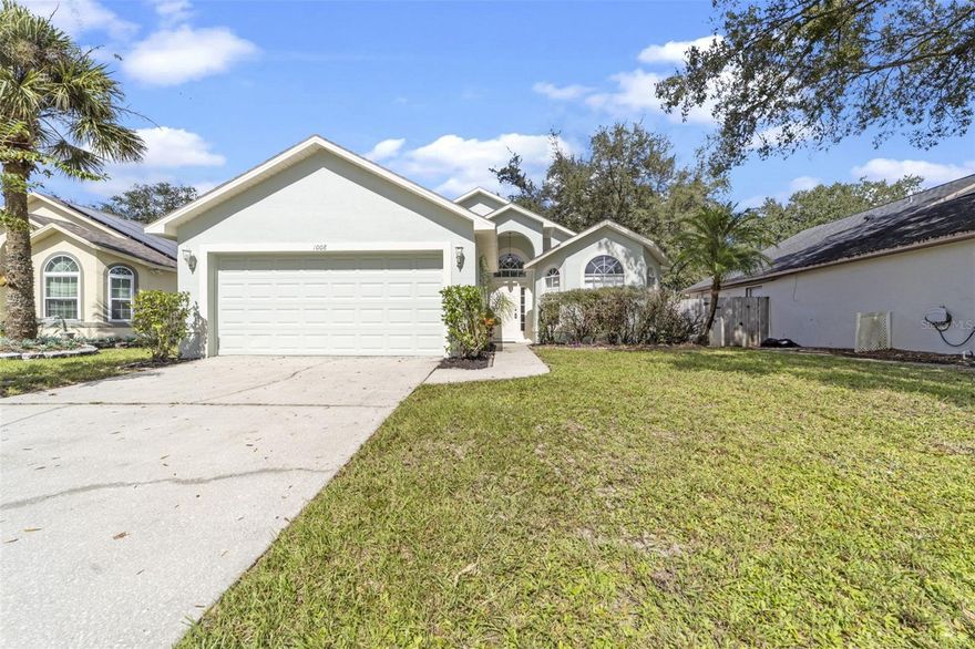 Welcome to 1008 Country Cove Ct, a charming single-family home located in the desirable city of Oviedo, FL. With 3 bedrooms and 2 bathrooms and a total of 1,455 sq. ft. of finished living space, this home provides ample room for comfortable living. The lot size is 6,058 sq.ft., giving plenty of outdoor space for recreation and entertainment. Upon entering the home, you are greeted by a warm and welcoming interior with a modern vibe that is filled with natural light. The floor plan connects the living room, kitchen and modern dining area featuring a beautiful accent wall creating a perfect space for gatherings and everyday living. The fully updated kitchen is equipped with modern appliances, ample cabinet storage, and a breakfast bar for casual dining. The primary bedroom is spacious and features a private en-suite bathroom for added convenience. The remaining two bedrooms are also generously sized and fully painted with beautiful matching modern floors. This home boasts numerous updates, including a newer roof, new light fixtures, quartz countertop added to the spacious island, new slide-in stove, and newer refrigerator, among many others. Both bathrooms are well-maintained and offer a clean and contemporary design with guest bathroom featuring a modern skylight that fills the space with natural light. Outside, the property boasts a well-maintained yard and patio area, perfect for enjoying the Florida sunshine. The neighborhood of Country Cove is known for its tranquil setting and friendly atmosphere, making it a wonderful place to call home. In addition to the home's modern features with amazing skylights, and newer roof, the house has been painted inside and out. The location of 1008 Country Cove Ct is unbeatable. Situated within very close proximity to top rated Elementary and Middle Schools and zoned for renowned Haggerty High School, Oviedo is a vibrant city with beautiful parks, shopping centers, and dining options. Residents can enjoy a variety of recreational activities, such as hiking, biking, and golfing, all within close proximity to the property. Overall, 1008 Country Cove Ct is a fantastic opportunity for those seeking a comfortable, well-maintained home in a prime location. Whether you are a first-time homebuyer, downsizing, or looking for a vacation retreat, this property has everything you need for a relaxed and enjoyable lifestyle. Don't miss out on this wonderful opportunity!
