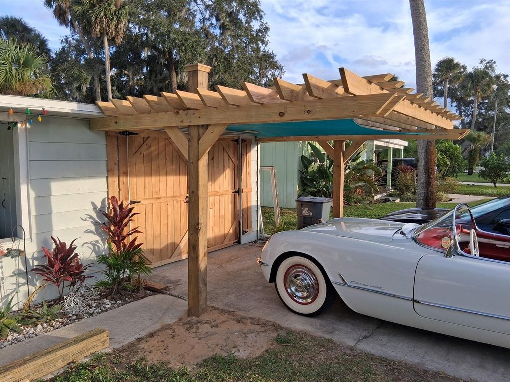 Photo of 69 E Bayshore Drive, Port Orange, FL 32127 (MLS # NS1087692)