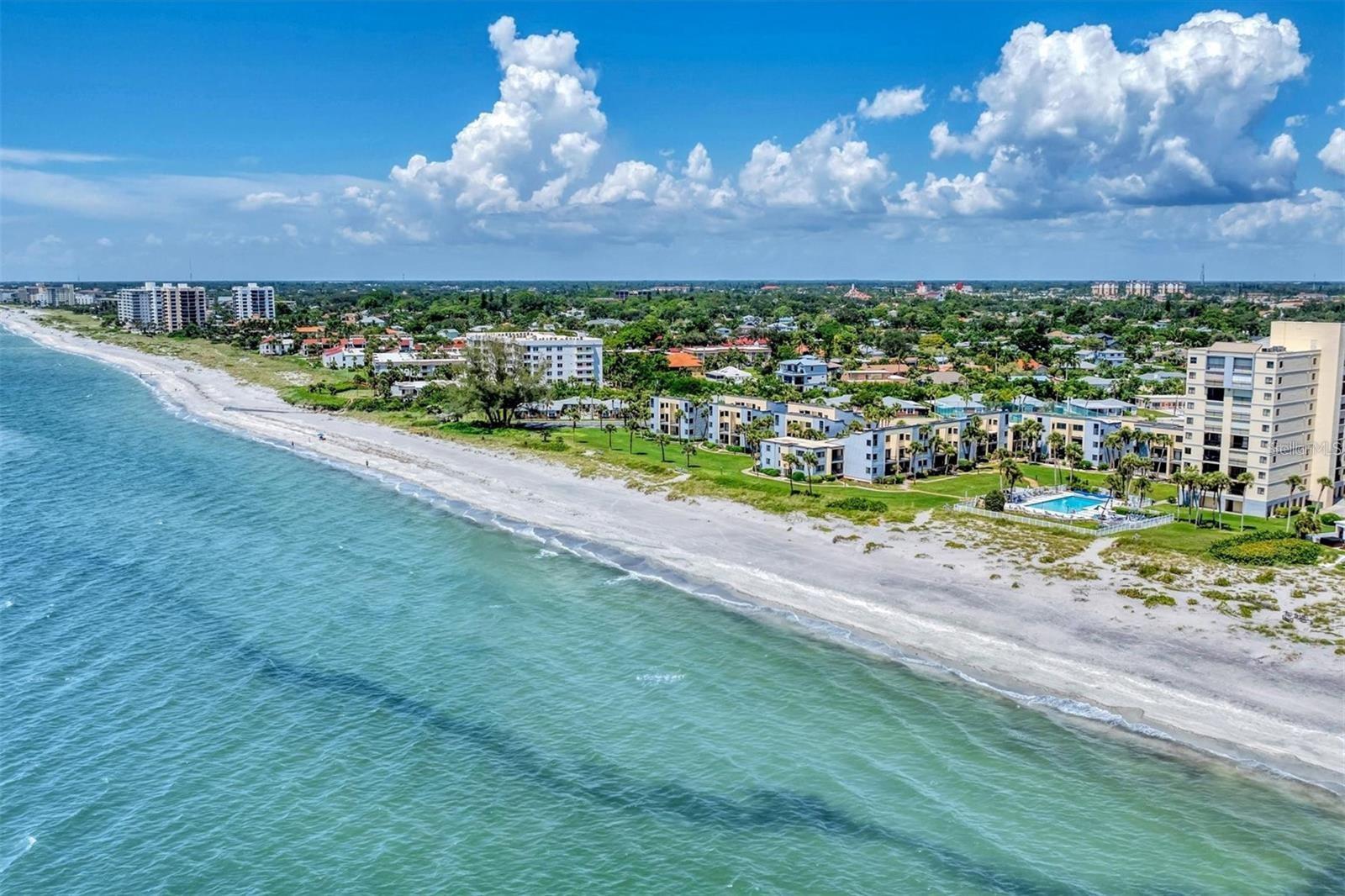 Meticulously maintained, 2 bedroom, 2 bathroom, beachfront condo available in the highly sought after MacArthur Beach & Racquet Club. This property has been fully updated and comes boasting with features such as luxury vinyl flooring throughout, brand new A/C system, quartz countertops, newer stainless steel appliances, crown molding, custom bathrooms with walk-in showers, solid wood cabinetry throughout, newer water heater, plantation shutters, newer faucets and fixtures, and the list goes on. Offering panoramic views of the private beach, Gulf of Mexico, and the community pool from almost anywhere in unit. Full views exclusively from your back lanai. MacArthur Beach & Racquet Club is an exclusive community and includes great amenities, an abundance of covered and uncovered parking, tennis courts, a community heated pool, building insurance, water, cable tv packages, maintenance, escrow reserve funds, and gated security. Conveniently located only minutes to Downtown Venice Avenue, shopping, dining, entertainment, golfing, boating, and other beaches on Venice Island as well. Great opportunity to live maintenance free and close to everything. This won't last long so call and schedule your private showing today.
