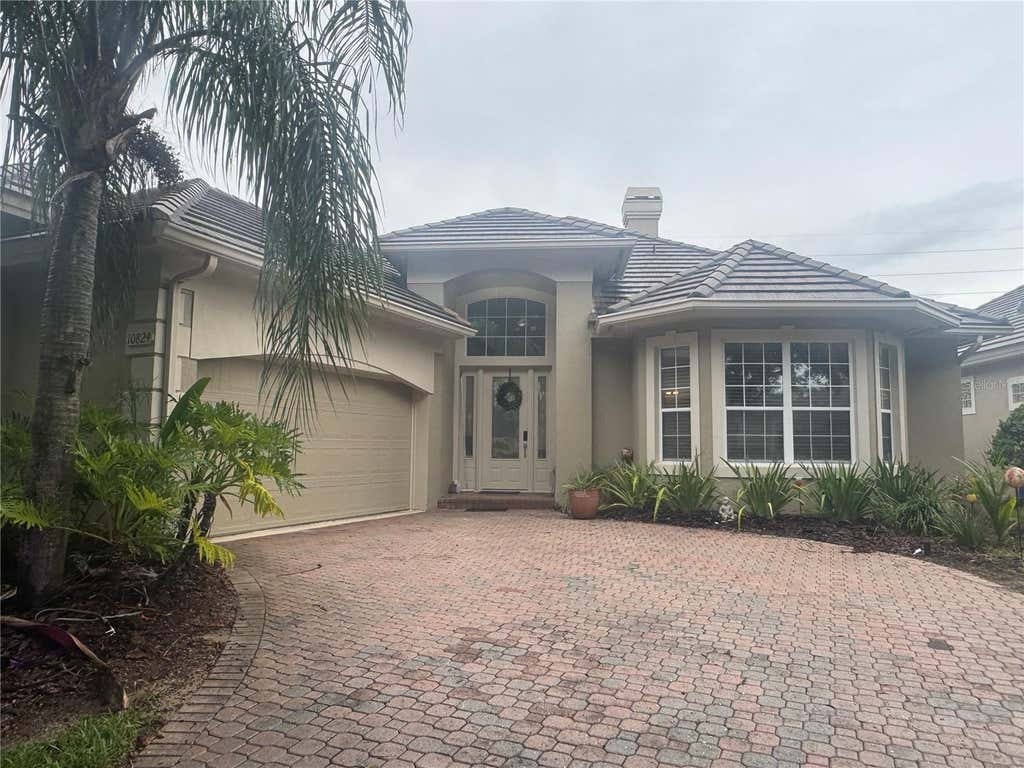 Photo of 10824 Woodchase Circle, Orlando, FL 32836 (MLS # O6432187)
