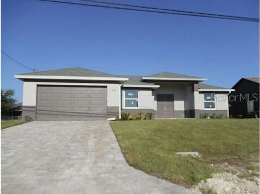 Welcome to this 2024-built home in Cape Coral, Florida, offering move-in ready convenience without the wait of new construction. This 3-bedroom, 2-bath home with a dedicated office spans 1,726 square feet and features tile flooring throughout for a clean, low-maintenance finish. The open-concept layout creates a bright, functional living space, with a modern kitchen that flows directly into the main living area, making it ideal for both everyday living and entertaining. The primary suite includes a private en-suite bath and dual closets, while the additional bedrooms and office provide flexibility for guests, work, or extra living space. Step outside to a screened-in pool area complete with a built-in BBQ station and sink, creating a great setup for outdoor living and entertaining year-round. Conveniently located near parks, schools, shopping, and dining, this home offers a strong combination of functionality, location, and overall value.