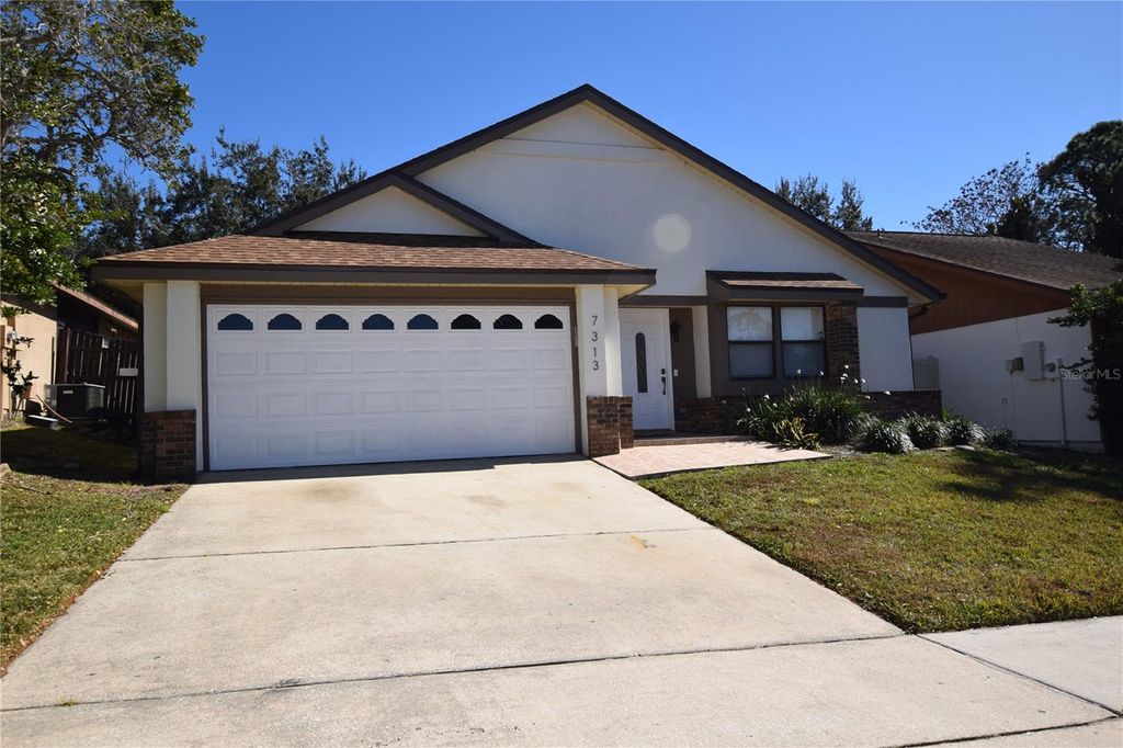 Photo of 7313 Spring Villas Circle, Orlando, FL 32819 (MLS # O6379075)