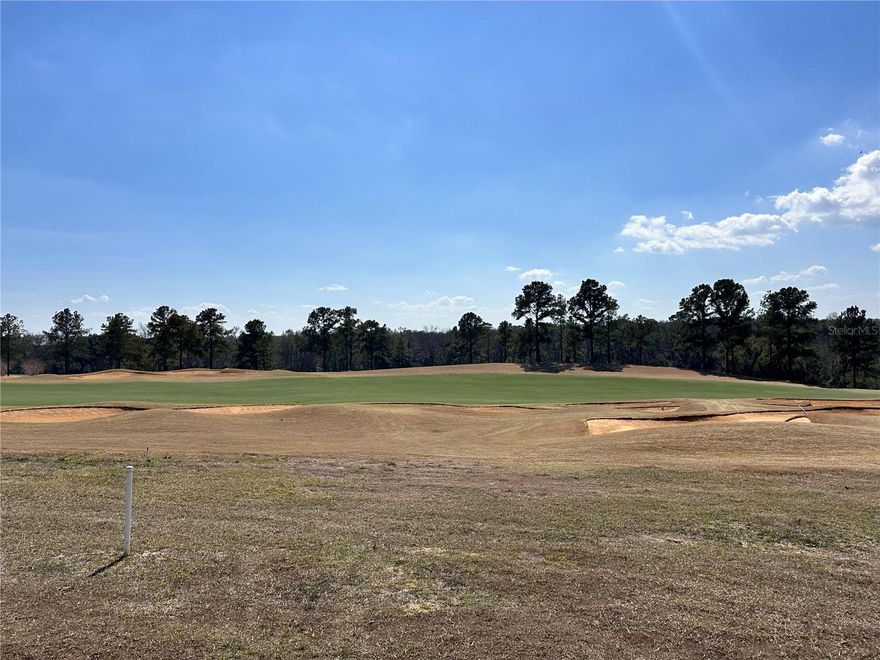 Build your custom dream home on this exceptional golf course homesite overlooking the 10th fairway in the private, guard-gated community of Bella Collina. Perfectly positioned on a one-way street, this property offers added privacy with limited through traffic and a peaceful setting. The south-facing backyard captures beautiful natural light throughout the day and provides sweeping views across the 10th fairway—creating the perfect setting for expansive outdoor living, a resort-style pool, and an oversized lanai designed for year-round enjoyment. Floor-to-ceiling glass and open-concept living spaces would perfectly frame the manicured golf vistas while maximizing light and warmth.

There is no required timeframe to begin construction, allowing you to build at your pace with one of Bella Collina’s premier fully custom builders. Whether you envision a modern masterpiece or timeless Mediterranean-inspired architecture, this homesite provides the perfect canvas.

As an added advantage, the developer will defer the $40,000 Sports Membership Deposit at closing, along with additional developer incentives.

Bella Collina offers a lifestyle unlike any other, including a Nick Faldo-designed championship golf course, resort-style pool, tennis and pickleball courts, luxury spa, state-of-the-art fitness center with complimentary weekly classes, and multiple on-site dining venues—all conveniently located near Montverde Academy with easy access to the Florida Turnpike, 408, and 429.

An exceptional opportunity to secure privacy, views, and value on the golf course.