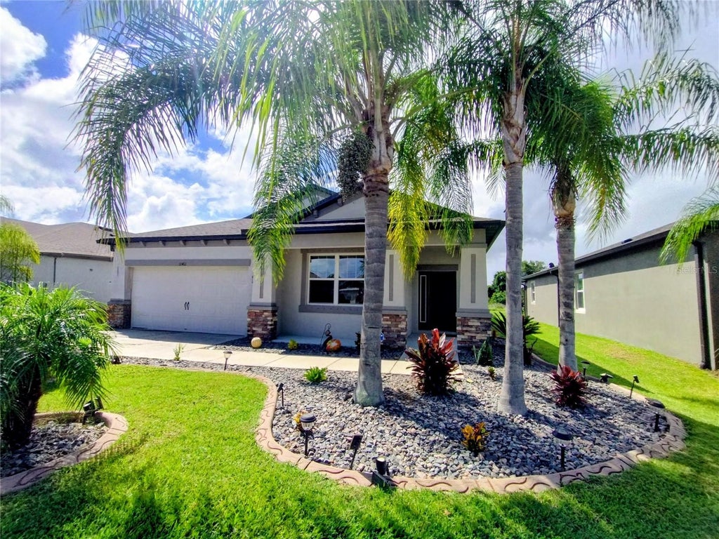 Photo of 11411 Acacia Grove Lane, Riverview, FL 33579 (MLS # TB8542629)