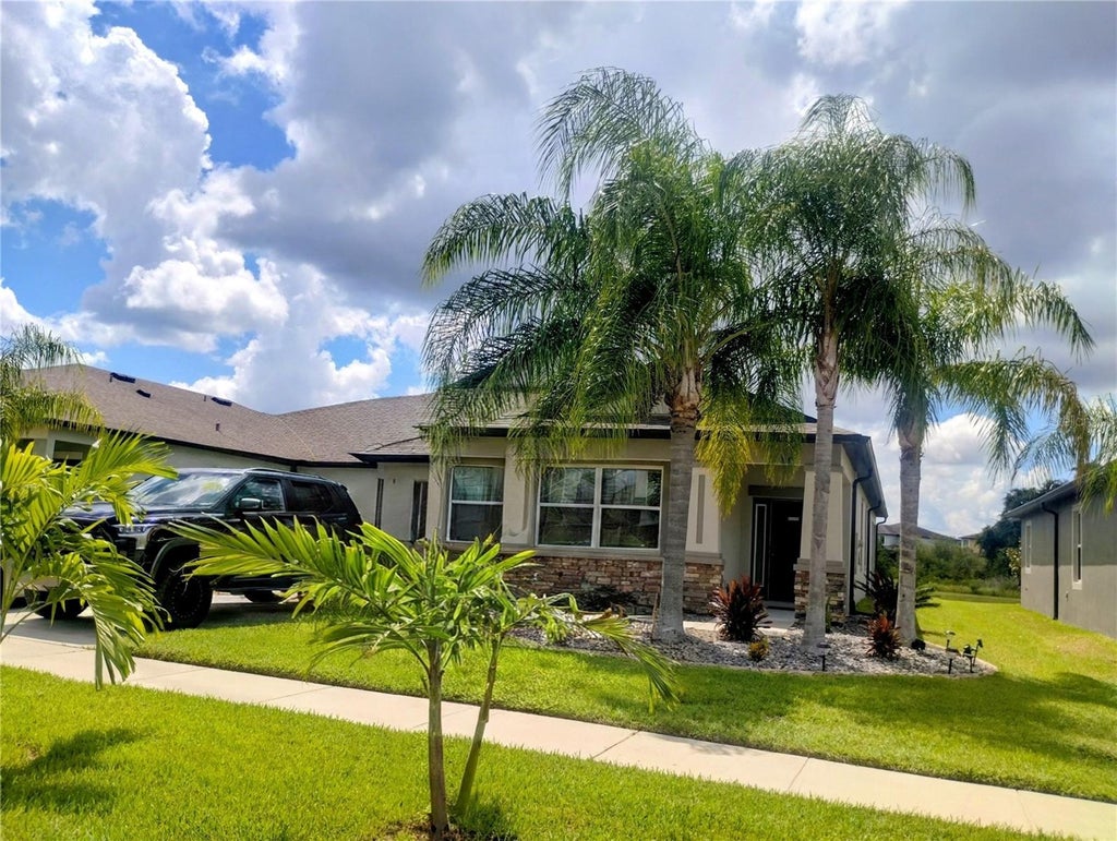 Photo of 11411 Acacia Grove Lane, Riverview, FL 33579 (MLS # TB8542629)