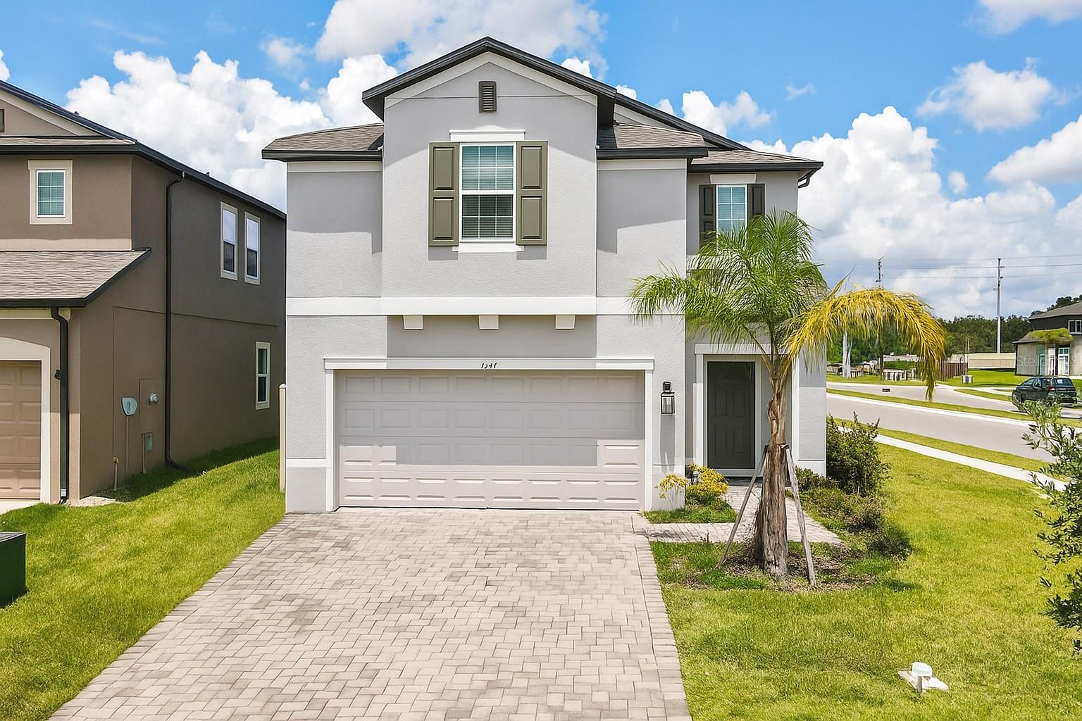 Now available for rent in the desirable Cobblestone community of Zephyrhills – welcome to 3047 Adams Cross Drive! This beautifully maintained 4-bedroom, 3-bathroom home offers a spacious and functional layout. Step inside to find an open-concept living area filled with natural light, a well-appointed kitchen featuring stainless steel appliances, and a large kitchen island overlooking the main living space. The primary suite includes a private en-suite bath and generous walk-in closet, while three additional bedrooms provide flexibility for guests, a home office, or hobbies. ALL APPLIANCES INCLUDED, even the washer and dryer. Enjoy a fully fenced in, maintenance-free yard because LAWN CARE IS INCLUDED. Landlord has approved one small pet for an additional pet deposit. Schedule your showing today!