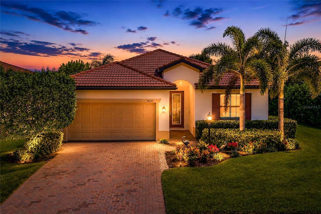 Photo of 10233 Loch Lomond Drive, Bradenton, FL 34211 (MLS # A4696390)