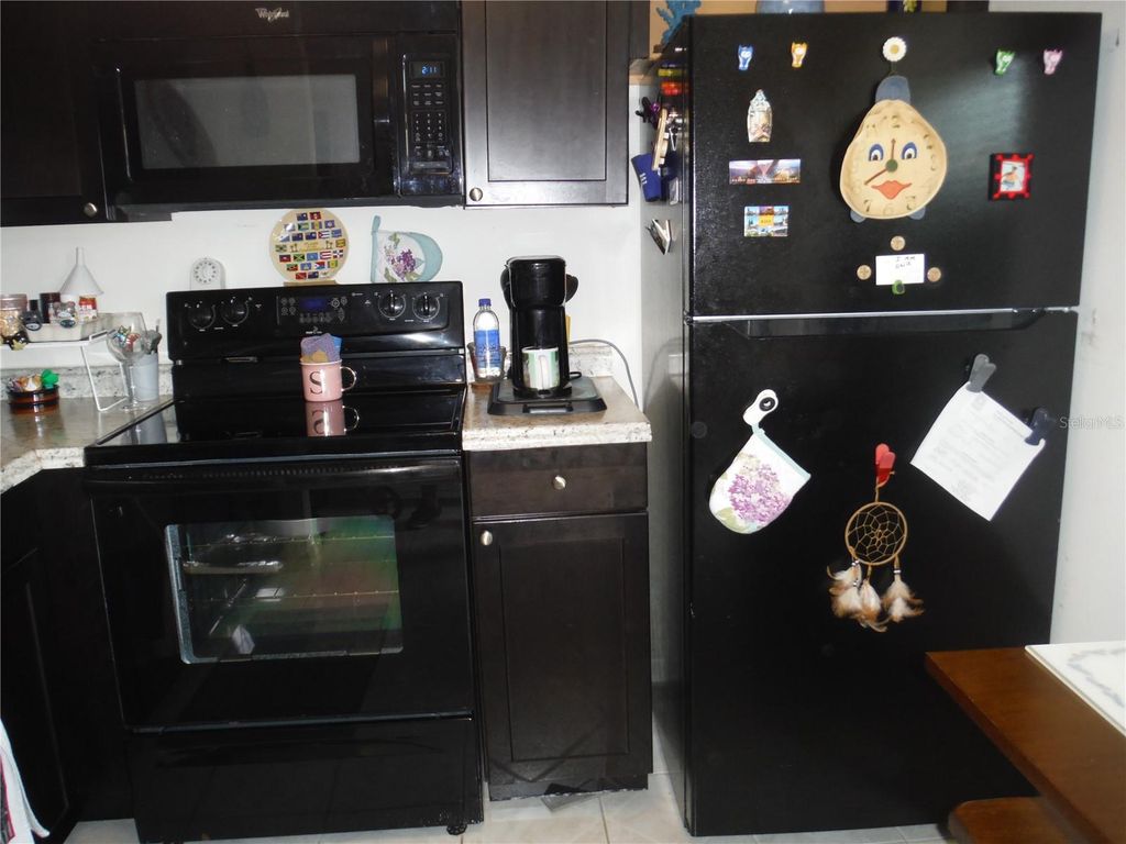 Photo of 1370 Heather Ridge Boulevard #104, Dunedin, FL 34698 (MLS # TB8435333)