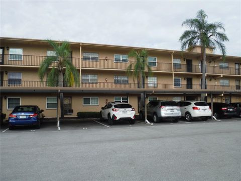 Photo of 1370 Heather Ridge Boulevard #104, Dunedin, FL 34698 (MLS # TB8435333)