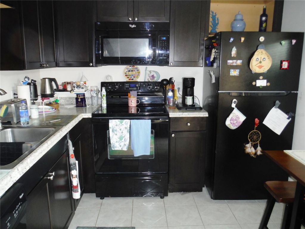 Photo of 1370 Heather Ridge Boulevard #104, Dunedin, FL 34698 (MLS # TB8435333)