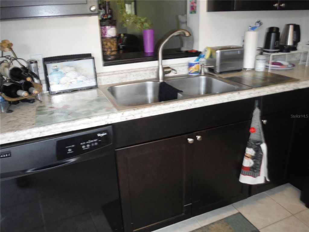 Photo of 1370 Heather Ridge Boulevard #104, Dunedin, FL 34698 (MLS # TB8435333)