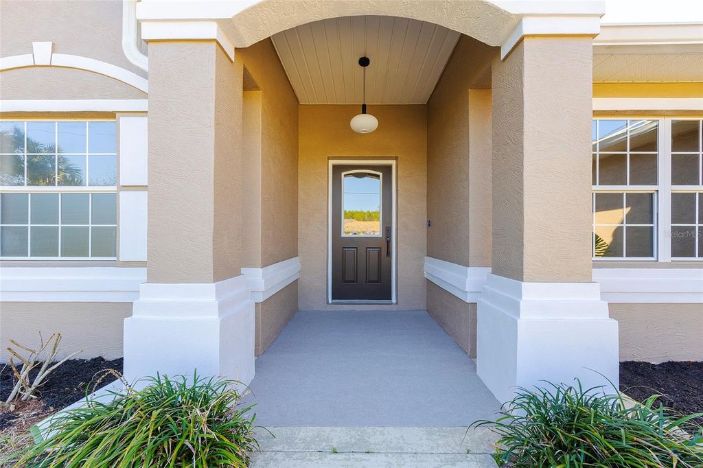 Photo of 9 Slipper Flower Path E, Palm Coast, FL 32164 (MLS # V4948311)