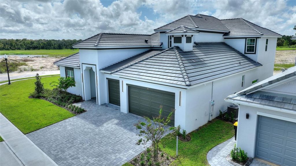 Photo of 107 Hampton Loop, Davenport, FL 33837 (MLS # S5137025)