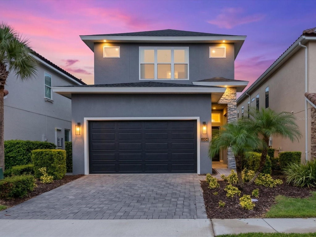 Photo of 1104 Castle Pines Court, Kissimmee, FL 34747 (MLS # O6444039)