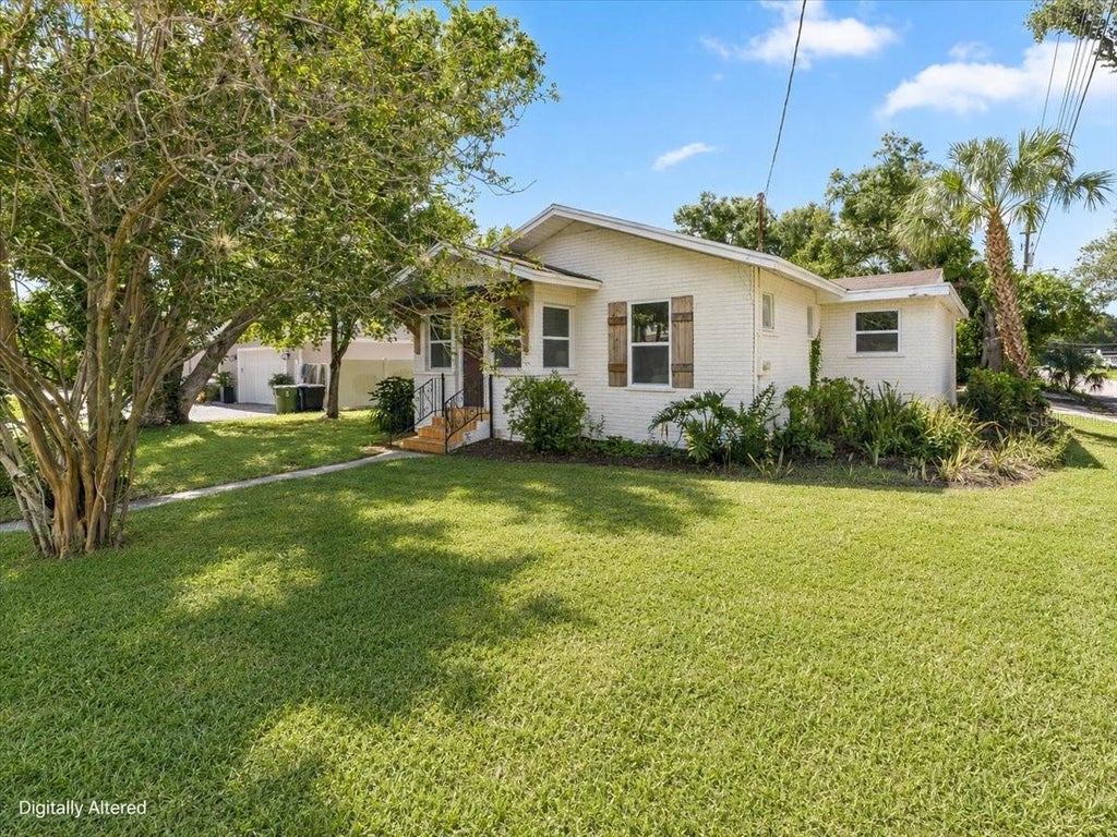 Photo of 820 W Woodlawn Avenue, Tampa, FL 33603 (MLS # TB8545018)