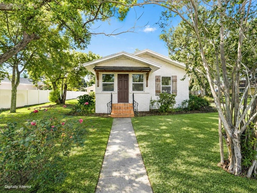 Photo of 820 W Woodlawn Avenue, Tampa, FL 33603 (MLS # TB8545018)