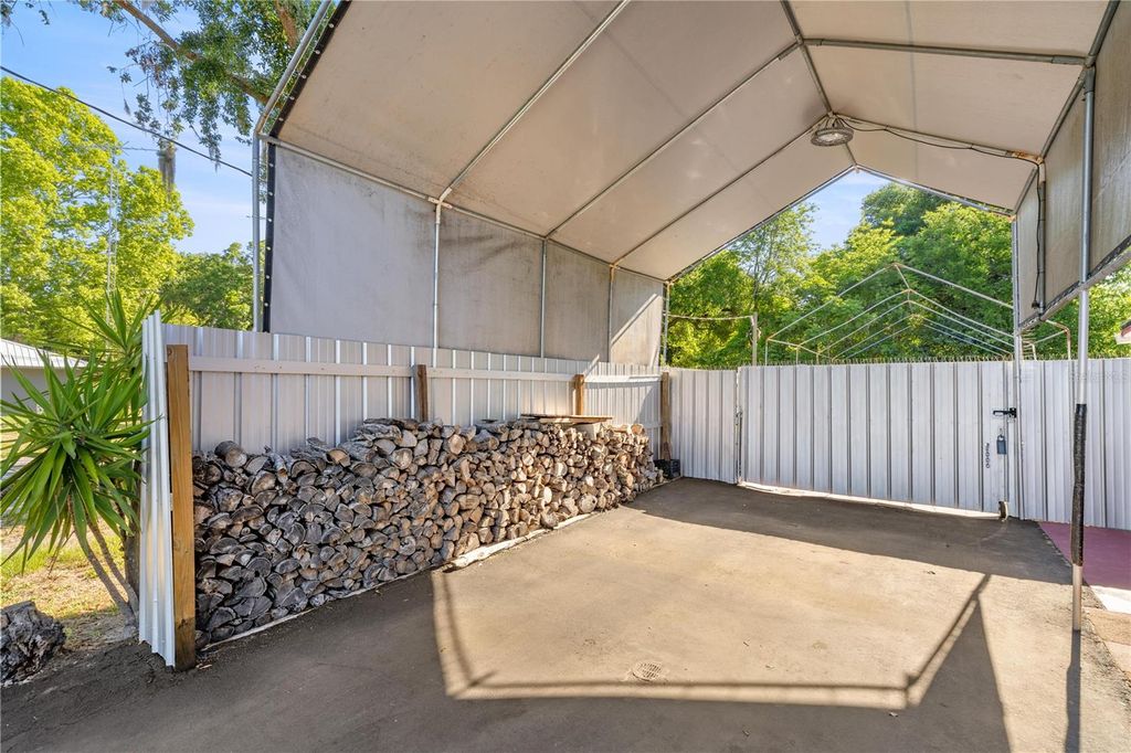 Photo of 12351 SE Hwy 464, Ocklawaha, FL 32179 (MLS # OM713773)