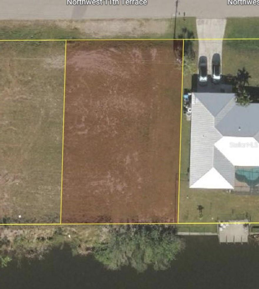 Build-ready and perfectly positioned, this lot at 1210 NW 11th Ter in Cape Coral offers direct access to a freshwater canal; ideal for kayaking, fishing, and enjoying Southwest Florida’s laid-back lifestyle. Located in a rapidly developing area with new construction nearby, this property presents a great opportunity to invest or create your custom home in one of Cape Coral’s growing neighborhoods. Enjoy peaceful water views right from your future backyard while still being conveniently close to shopping, dining, and everyday essentials.