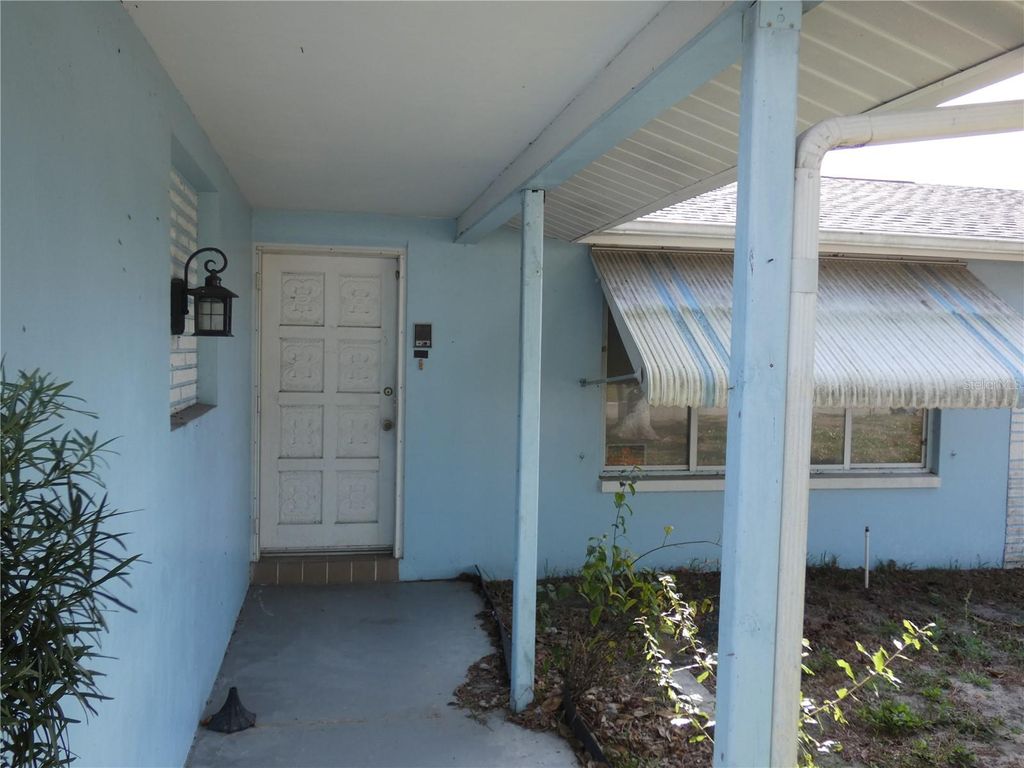 Photo of 7526 Pineapple Lane, Port Richey, FL 34668 (MLS # W7882005)